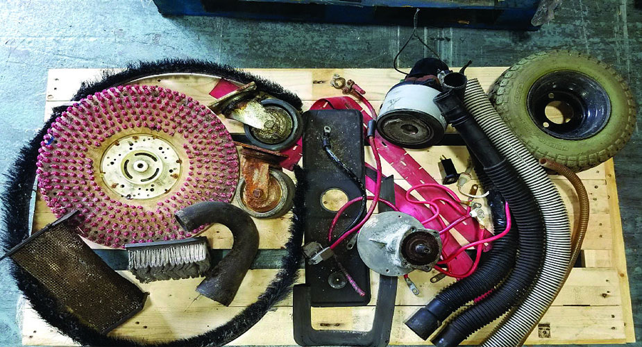 Removed commercial floor scrubber parts